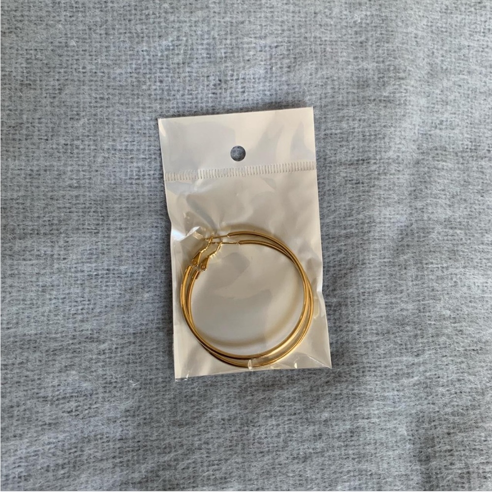 Large 50 mm hoop earrings in gold color